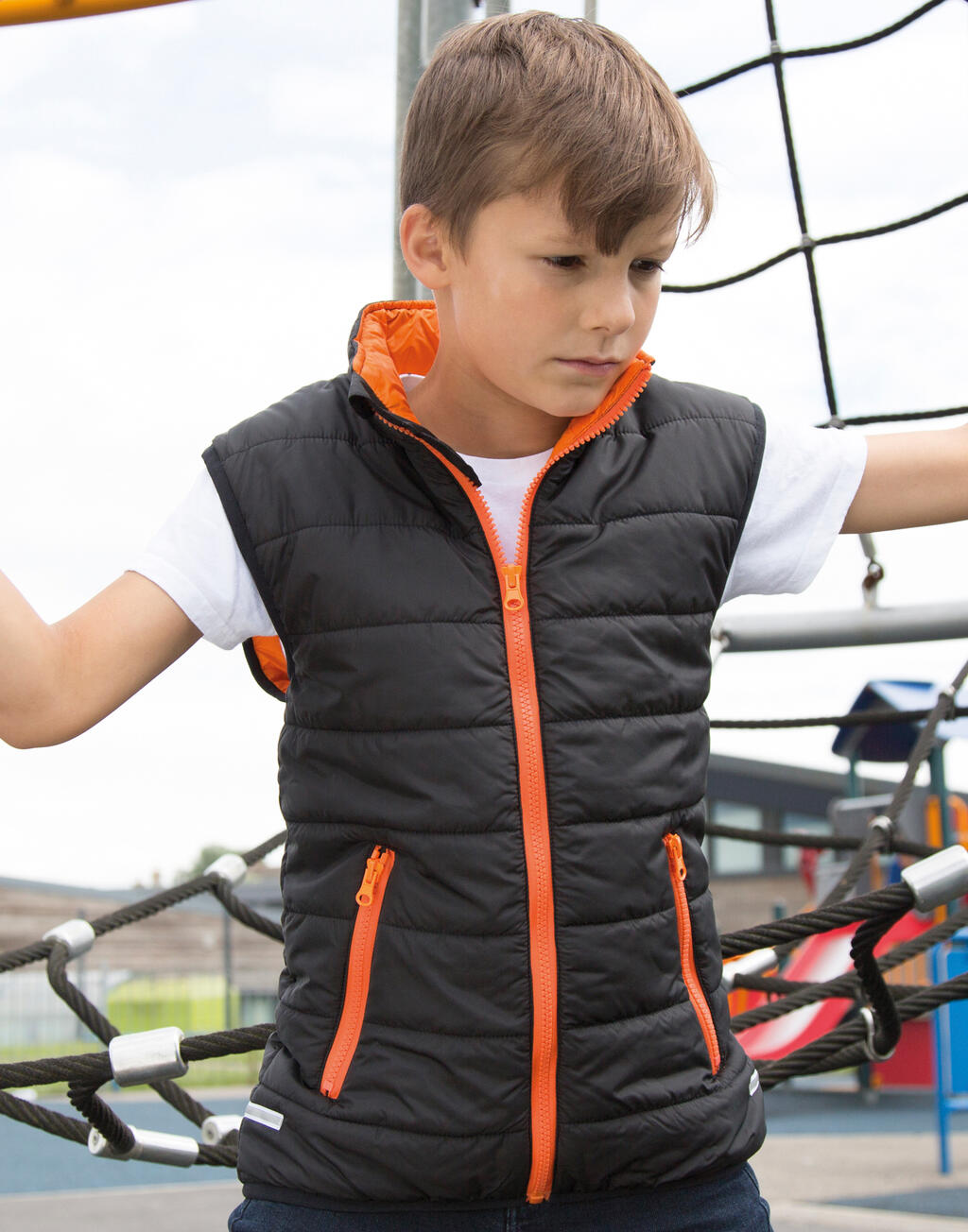  Junior/Youth Padded Bodywarmer in Farbe Black/Orange